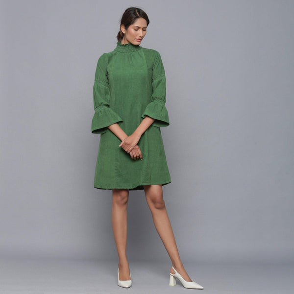 Front View of a Model wearing Moss Green Corduroy High Neck Dress