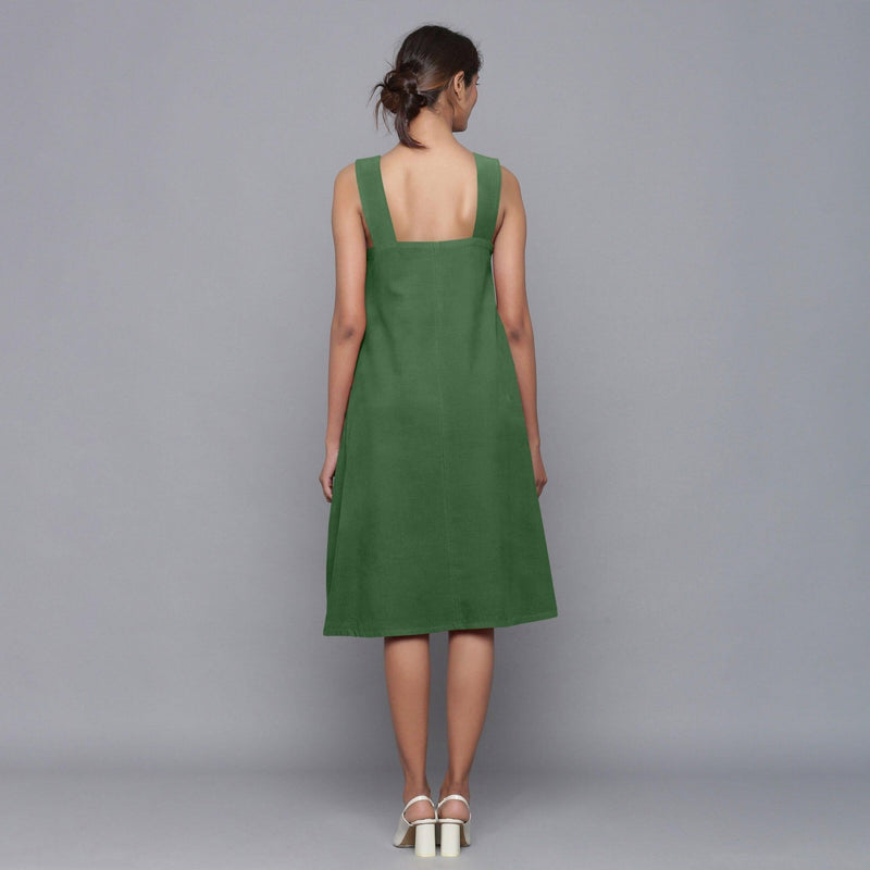 Back View of a Model wearing Moss Green Corduroy Flared Dress