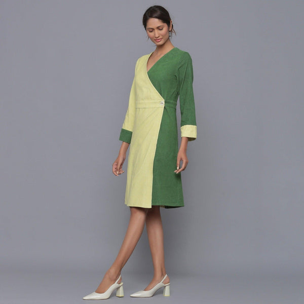 Left View of a Model wearing Cotton Corduroy V-Neck Wrap Dress