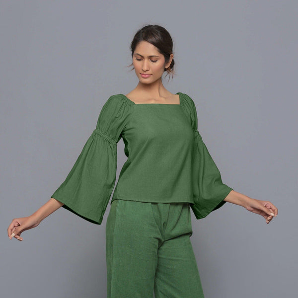 Front View of a Model wearing Moss Green Pistachio Corduroy Bohemian Top