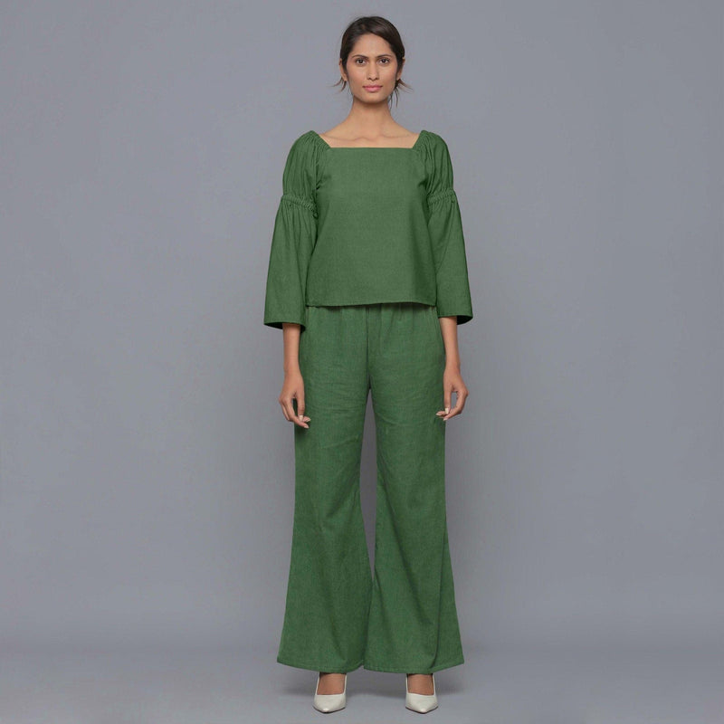 Front View of a Model wearing Moss Green Pistachio Corduroy Bohemian Top