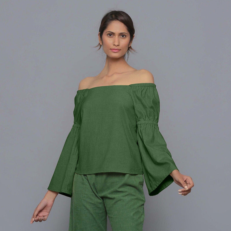 Front View of a Model wearing Moss Green Pistachio Corduroy Bohemian Top