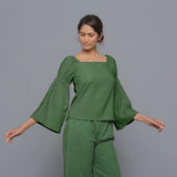 Front View of a Model wearing Moss Green Pistachio Corduroy Bohemian Top