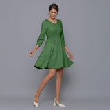 Front View of a Model wearing Moss Green V-Neck Corduroy Dress