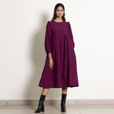 Front View of a Model wearing Warm Mulberry 100% Cotton Frilled Yoke Dress