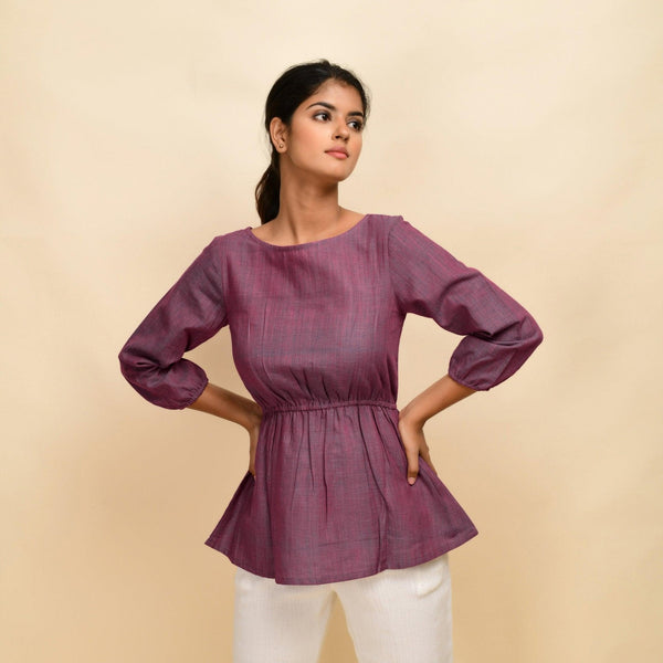 Front View of a Model wearing Mulberry Yarn-Dyed 100% Cotton Peplum Top