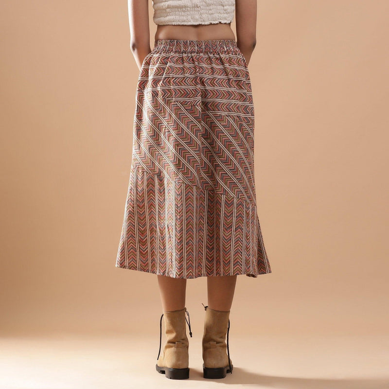 Back View of a Model wearing Kalamkari Chevron Striped Paneled Skirt