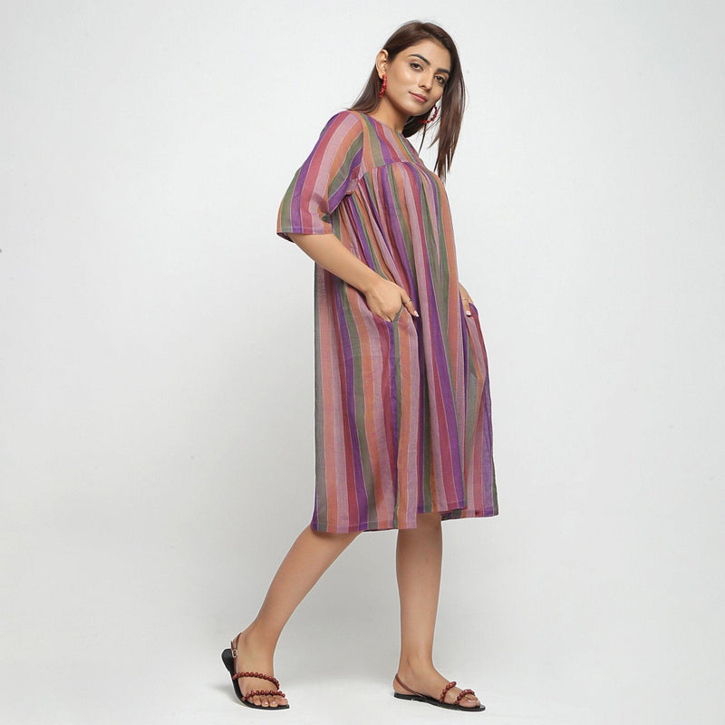 Right View of a Model wearing Multicolor Handwoven Gathered Dress