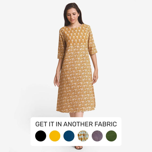 Front View of a Model wearing Mustard Block Printed Cotton Midi Yoke Dress