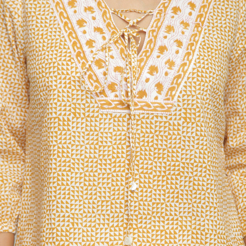 Front Detail of a Model wearing Mustard Hand Block Printed Straight Top