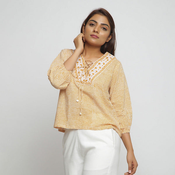 Front View of a Model wearing Mustard Hand Block Printed Straight Top