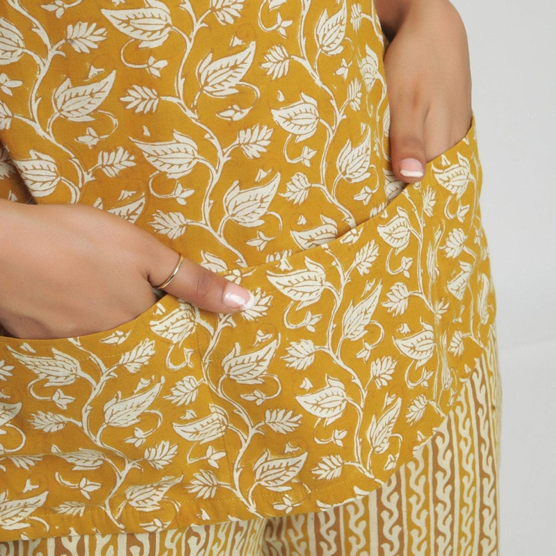 Front Detail of a Model wearing Mustard Bagru Block Printed Yoked Top