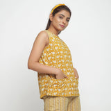 Right View of a Model wearing Mustard Bagru Block Printed Yoked Top