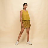 Right View of a Model wearing Musturd Gold 100% Cotton Khadi Short Shorts