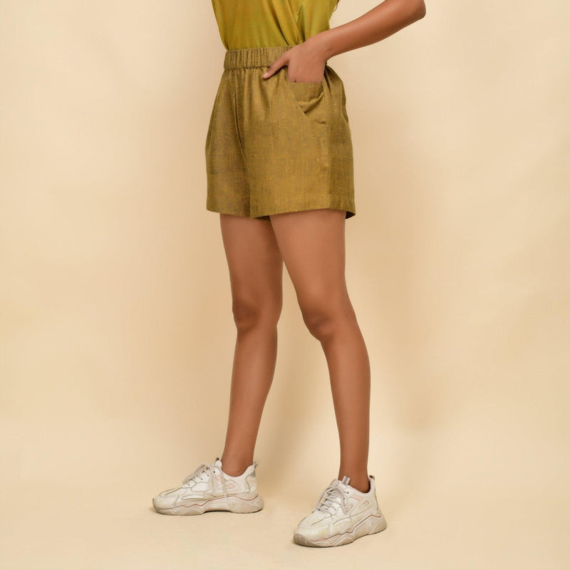 Left View of a Model wearing Musturd Gold 100% Cotton Khadi Short Shorts