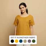 Front View of a Model wearing Mustard Cotton U-Neck Straight Top