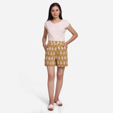 Front View of a Model wearing Bagru Block Print Mustard Straight Shorts