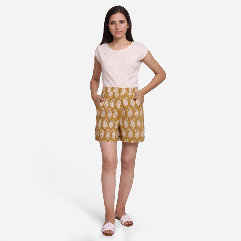 Front View of a Model wearing Bagru Block Print Mustard Straight Shorts