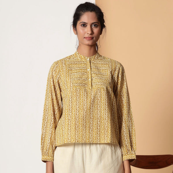 Front View of a Model wearing Mustard Striped Bagru Block Print Yoked Shirt