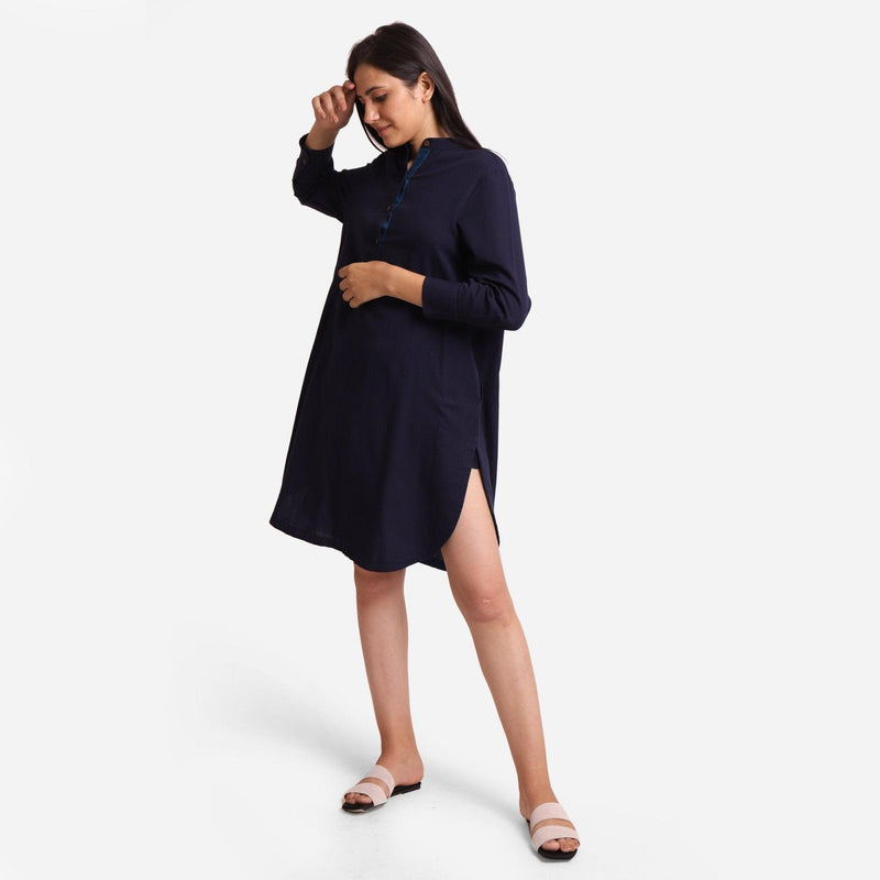 Left View of a Model wearing Navy Blue Cotton Flax Knee Length Shirt Dress