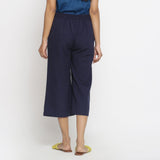 Back View of a Model wearing Solid Navy Blue Cotton Flax Culottes