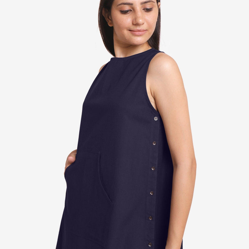 Left Detail of a Model wearing Navy Blue Cotton Flax Kangaroo Pocket Dress