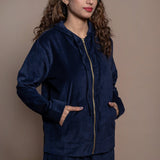 Front Detail of a Model wearing Navy Blue Cotton Velvet Hoodie Jacket