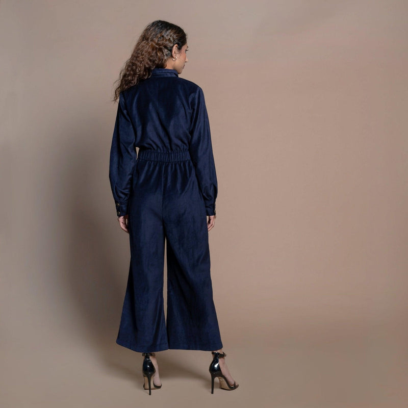 Back View of a Model wearing Navy Blue Cotton Velvet Bootcut Jumpsuit