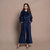 Front View of a Model wearing Navy Blue Cotton Velvet Bootcut Jumpsuit