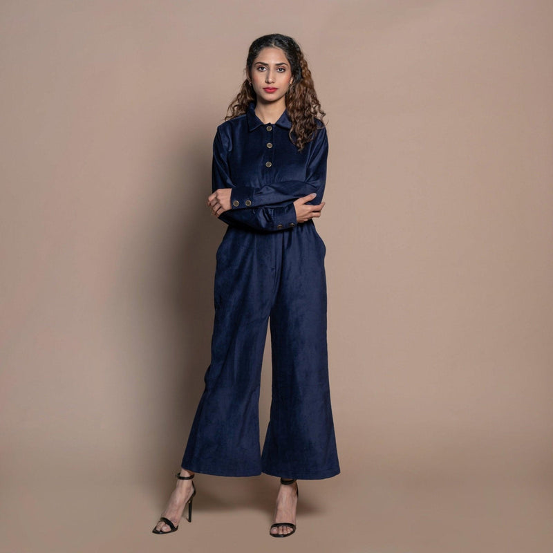 Front View of a Model wearing Navy Blue Cotton Velvet Bootcut Jumpsuit