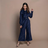 Front View of a Model wearing Navy Blue Cotton Velvet Bootcut Jumpsuit