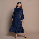 Front View of a Model wearing Navy Blue Cotton Velvet Tier Maxi Dress