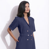 Front Detail of a Model wearing Navy Blue Cotton Waffle Knee Length Coat Dress