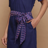 Left Detail of a Model wearing Navy Blue Handspun Ikat Straight Jumpsuit