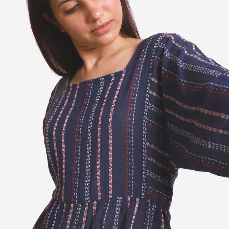 Front Detail of a Model wearing Navy Blue Crinkled Cotton Flared Jumpsuit