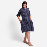 Right View of a Model wearing Navy Blue Crinkled Cotton Loose Fit Tunic