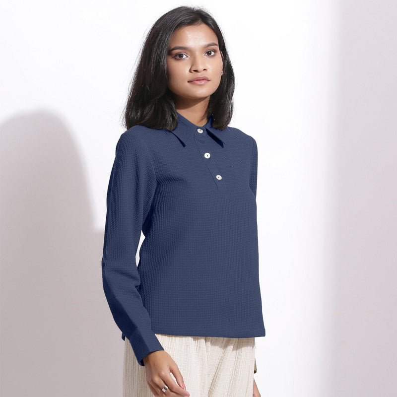 Right View of a Model wearing Navy Blue Cotton Waffle Polo Shirt