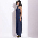 Left View of a Model wearing Navy Blue Honeycomb One-Shoulder Jumpsuit