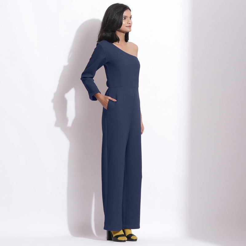 Right View of a Model wearing Navy Blue Honeycomb One-Shoulder Jumpsuit