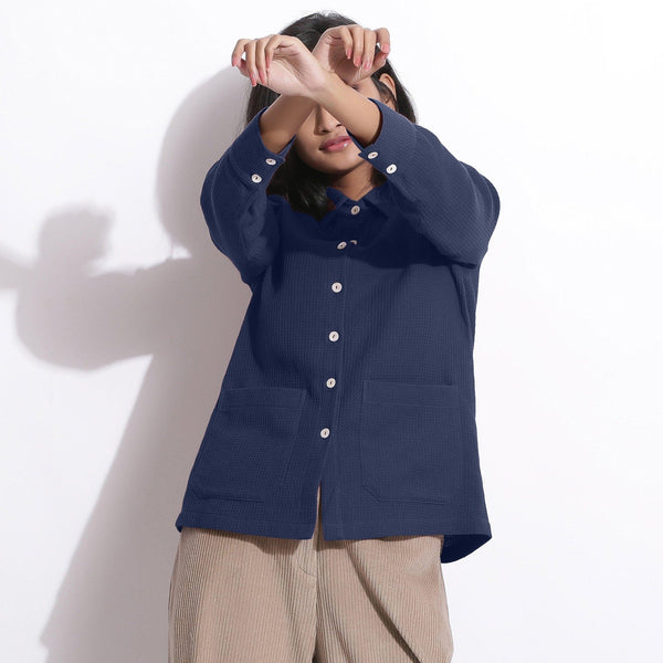 Front View of a Model wearing Navy Blue Waffle Button-Down Pocket Shirt