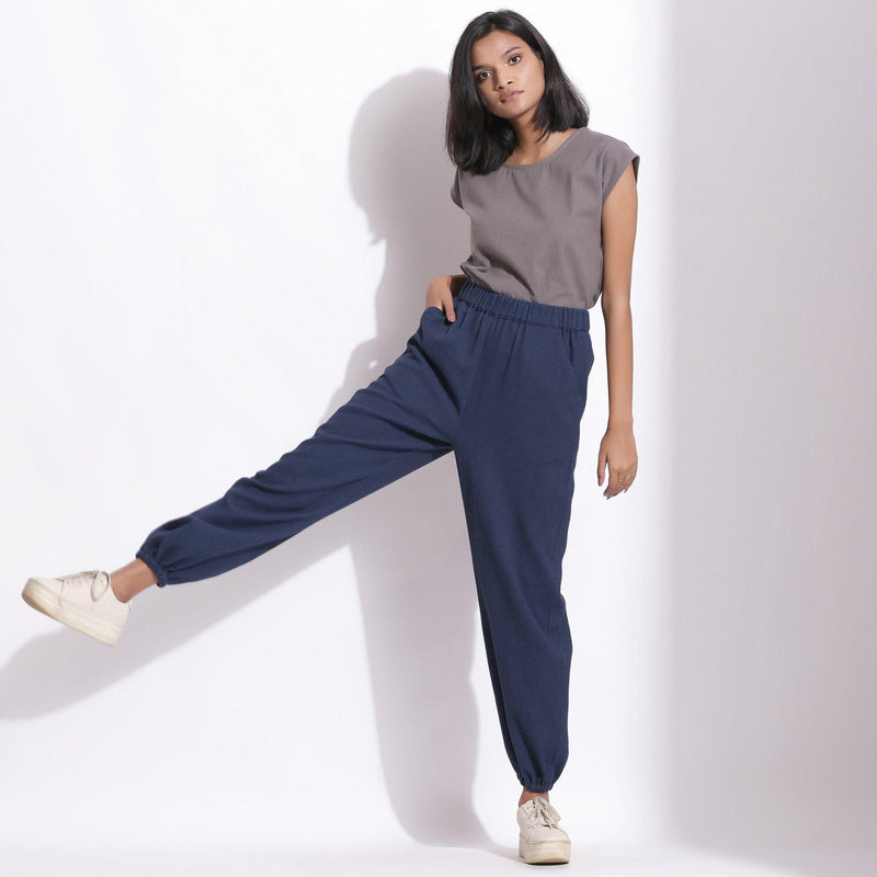 Front View of a Model wearing Comfy Navy Blue Cotton Waffle Jogger Pant