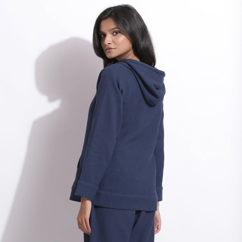 Back View of a Model wearing Navy Blue Cotton Waffle Hoodie Sweatshirt