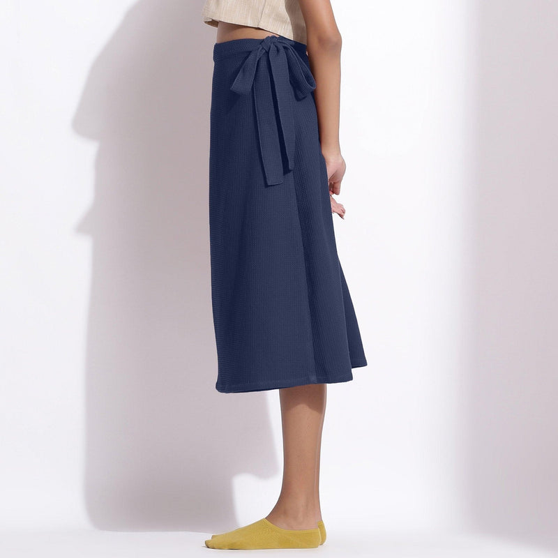 Left View of a Model wearing Navy Blue Cotton Waffle Wrap Skirt