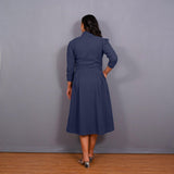 Back View of a Model wearing Navy Blue Warm Cotton Waffle Pleated Button-Down Midi Dress