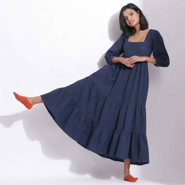 Front View of a Model wearing Navy Blue Cotton Waffle Tier Maxi Dress