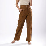 Front View of a Model wearing Handspun Oak Brown Straight Fit Cotton Pant