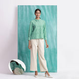 Front View of a Model wearing Ocean Green Handspun 100% Cotton Mirror Work Blouse Top