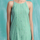 Front Detail of a Model wearing Ocean Green Handspun 100% Cotton A-Line Dress