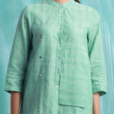 Front Detail of a Model wearing Ocean Green Handspun 100% Cotton Button-Down Top