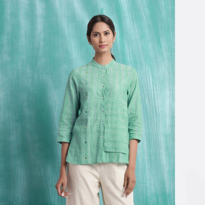 Front View of a Model wearing Ocean Green Handspun 100% Cotton Button-Down Top